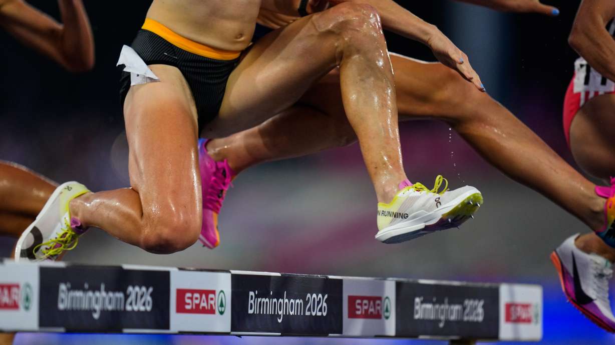 Athletes clear a barrier during the women's 3,000 meters steeplechase final at the European Athletics Championships in Birmingham, England, Thursday, Aug. 13, 2026.