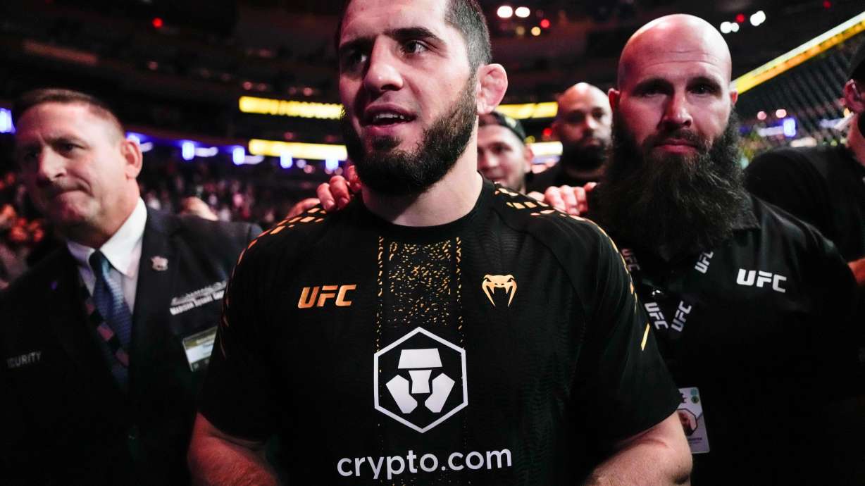 FILE - Russia's Islam Makhachev leaves a welterweight title bout after defeating Australia's Jack Della Maddalena at the UFC 322 mixed martial arts event, Saturday, Nov. 15, 2025, in New York.