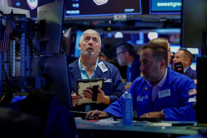 Traders work on the floor of the New York Stock Exchange in New York City on Aug. 7.
