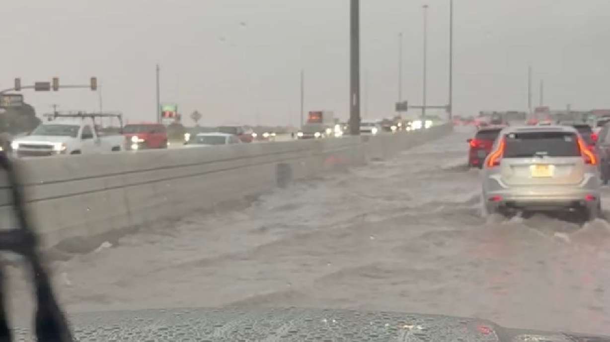 Flooding along I-15 near America First Field in Sandy on Thursday.