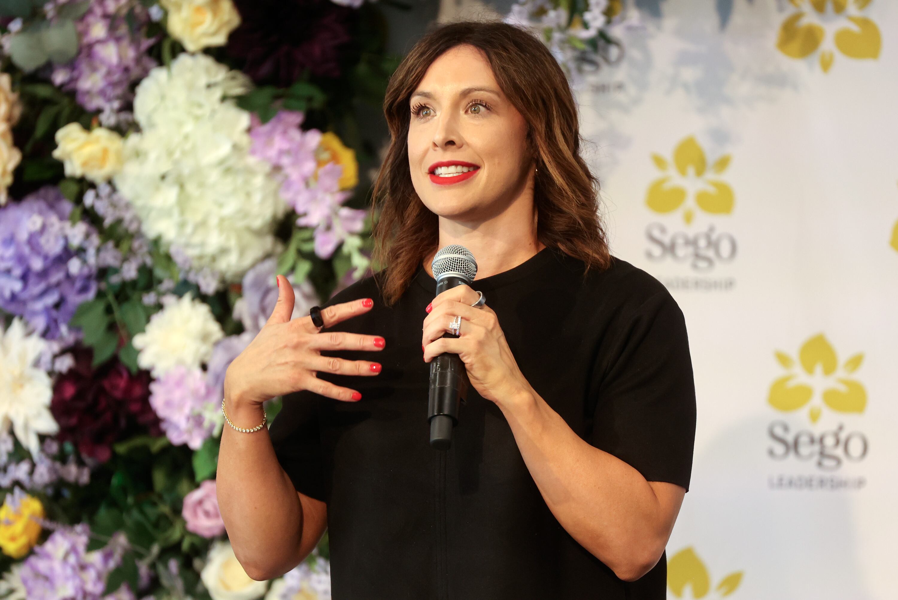 Jessica Collings, Boncom senior brand director, speaks at a press conference about the launch of Sego Leadership at The Other Side Village in Salt Lake City on Thursday.