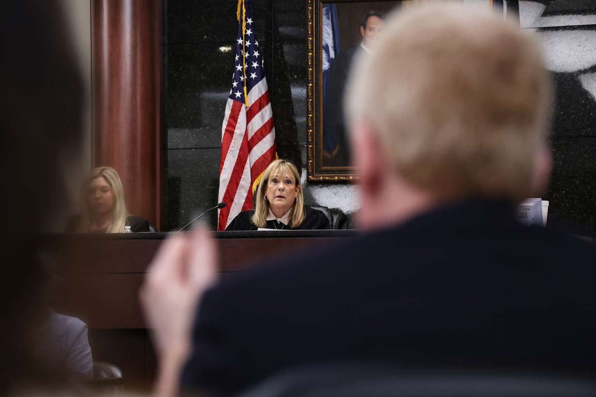 Judge Debra McCaslin listens to testimony as Alex Murdaugh watches during a hearing, Aug. 14, at the Marc H. Westbrook Judicial Center in Lexington, S.C. McCaslin admonished both sides in a Friday hearing to remain professional.