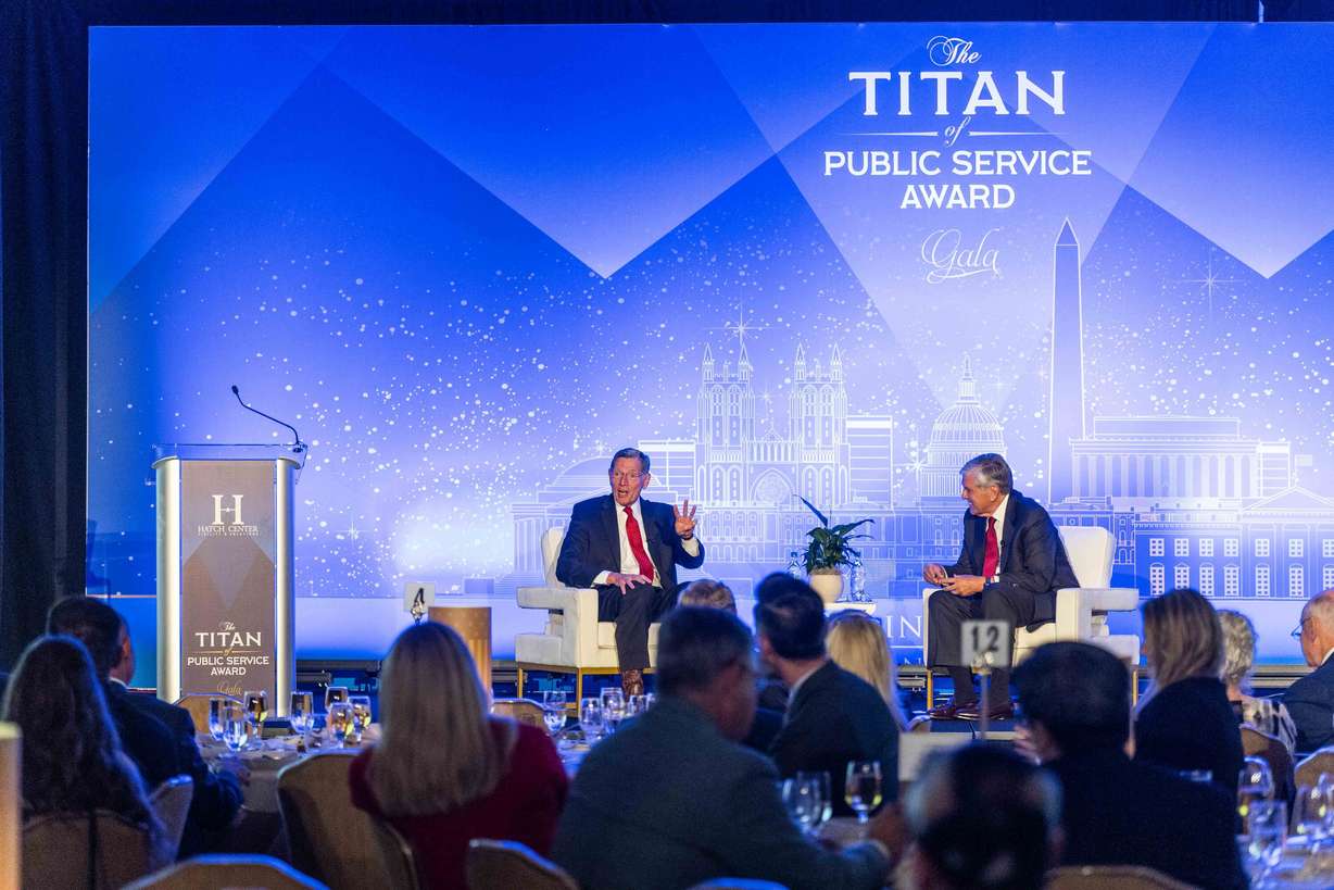 U.S. Senate Majority Whip John Barrasso, R-Wyo., left, speaks with former Oregon Sen. Gordon Smith at the annual Orrin G. Hatch Foundation Gala, where he received the Titan of Public Service Award, at the Grand America Hotel in Salt Lake City on Thursday.