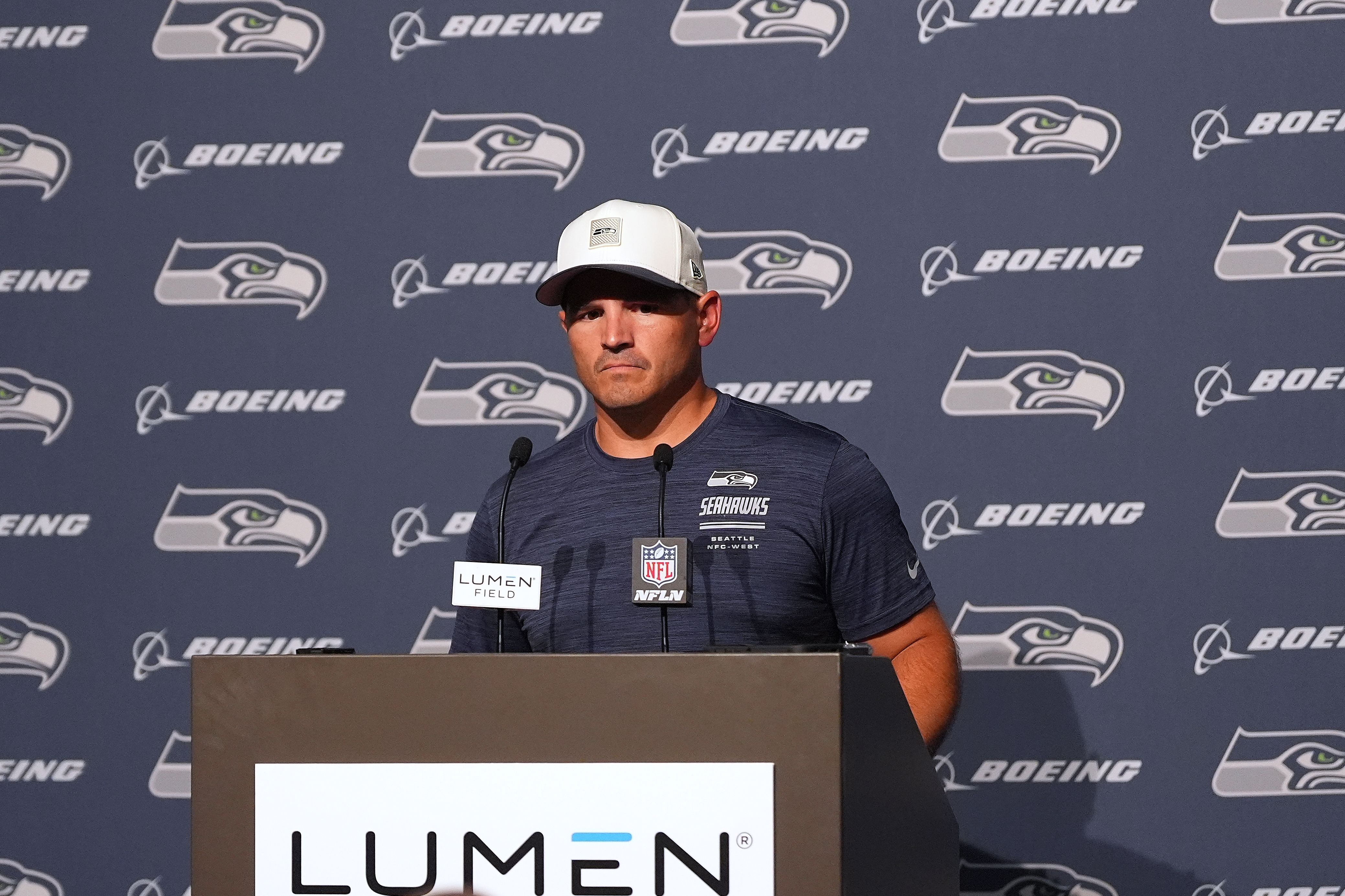 Seattle Seahawks head coach Mike Macdonald speaks during a press availability after the NFL football team's training camp, Saturday, Aug. 8, 2026, in Seattle. 