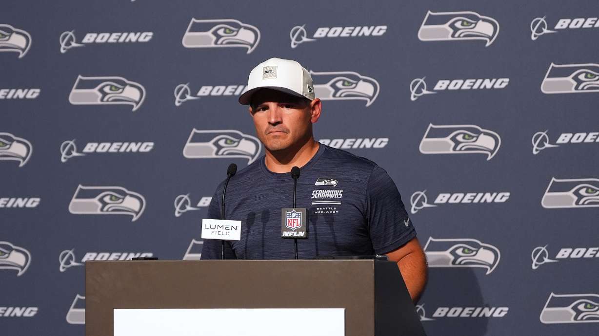 Seattle Seahawks head coach Mike Macdonald speaks during a press availability after the NFL football team's training camp, Saturday, Aug. 8, 2026, in Seattle.