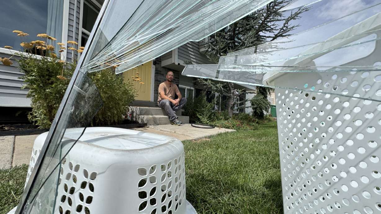 Clair Rosenberg said a window was shattered by a "wave" of flood waters, sending inches of water into his basement Thursday night. Cleanup was underway in multiple neighborhoods Friday after what city leaders characterized as a "50 to 100-year" rainstorm.