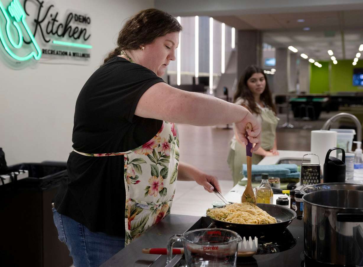 Amanda Kimball prepares zucchini pasta with a roasted caprese crown during a Fresh Food Friday budget cooking class at Utah Valley University in Orem on Friday.