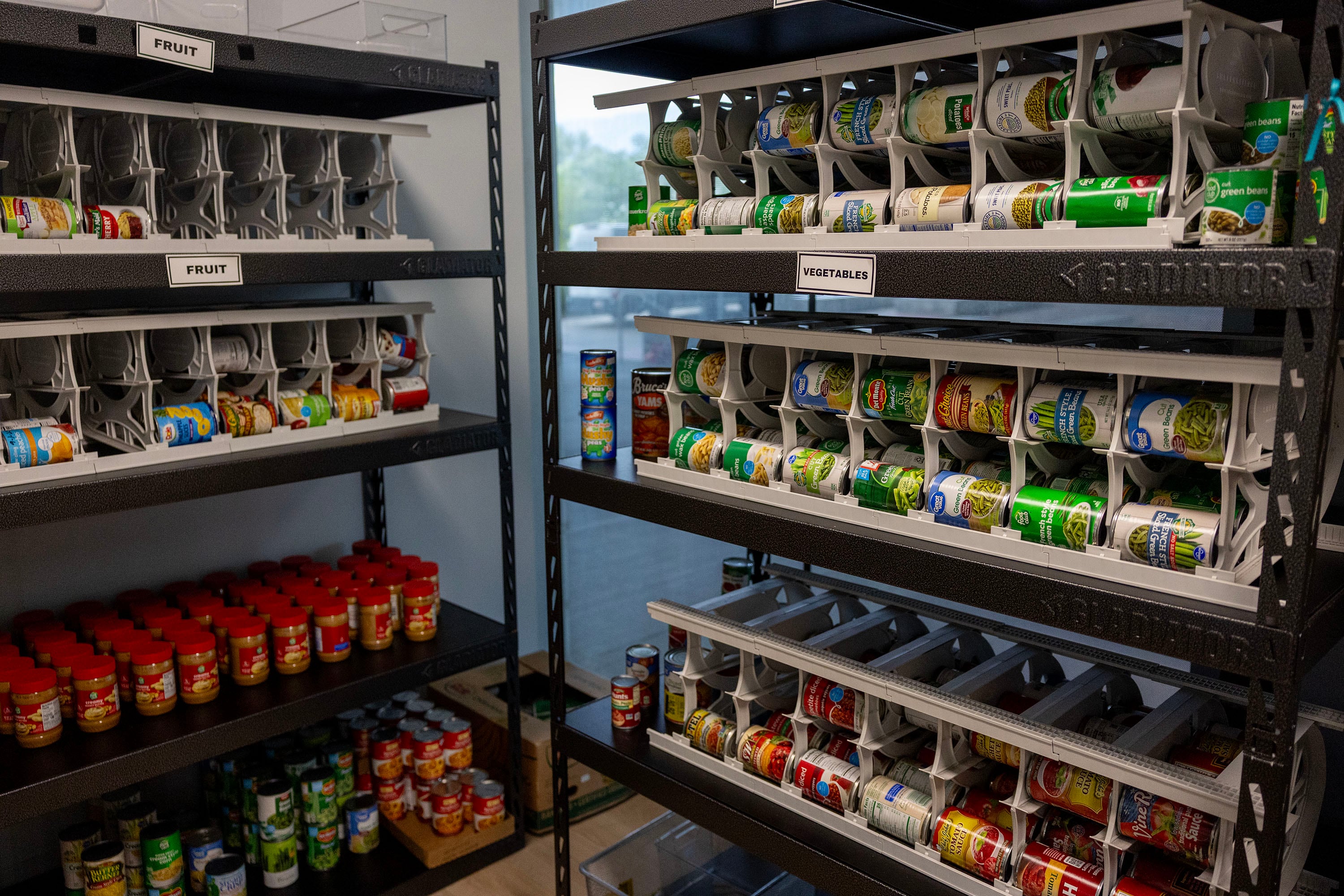 Free canned goods are available at the Utah Valley University Care Hub in Orem on Friday.