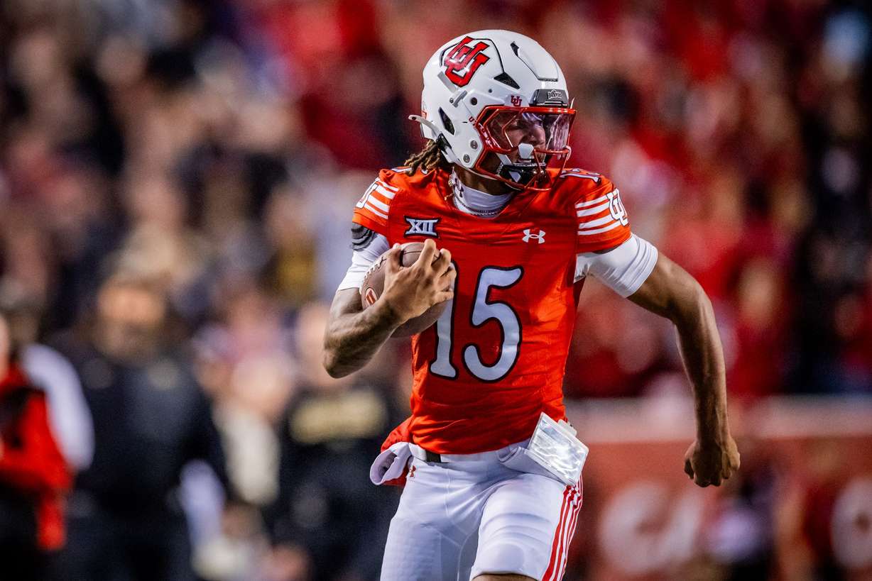 Utah Utes quarterback Byrd Ficklin (15) runs down the field to score a touchdown during an NCAA football game against the Colorado Buffaloes at Rice-Eccles Stadium in Salt Lake City on Oct. 25, 2025.