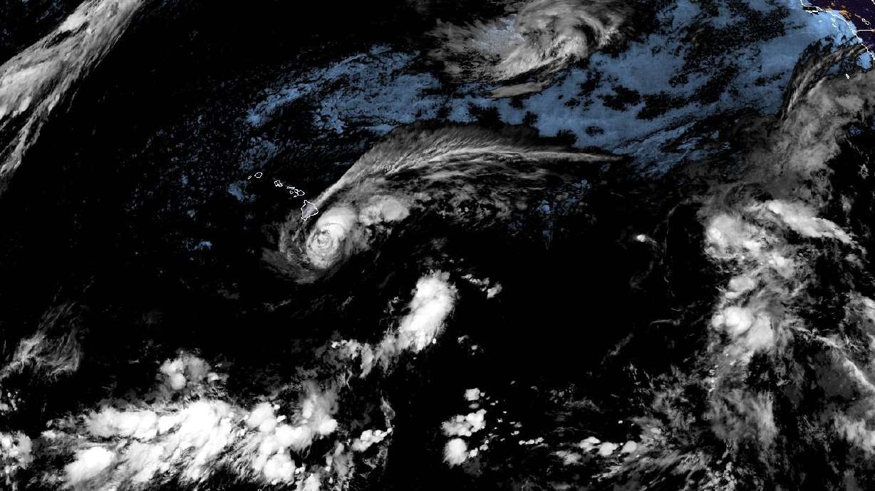 This satellite image released by NOAA shows Tropical Storm Lala over the Pacific Ocean, near Hawaii, Saturday.