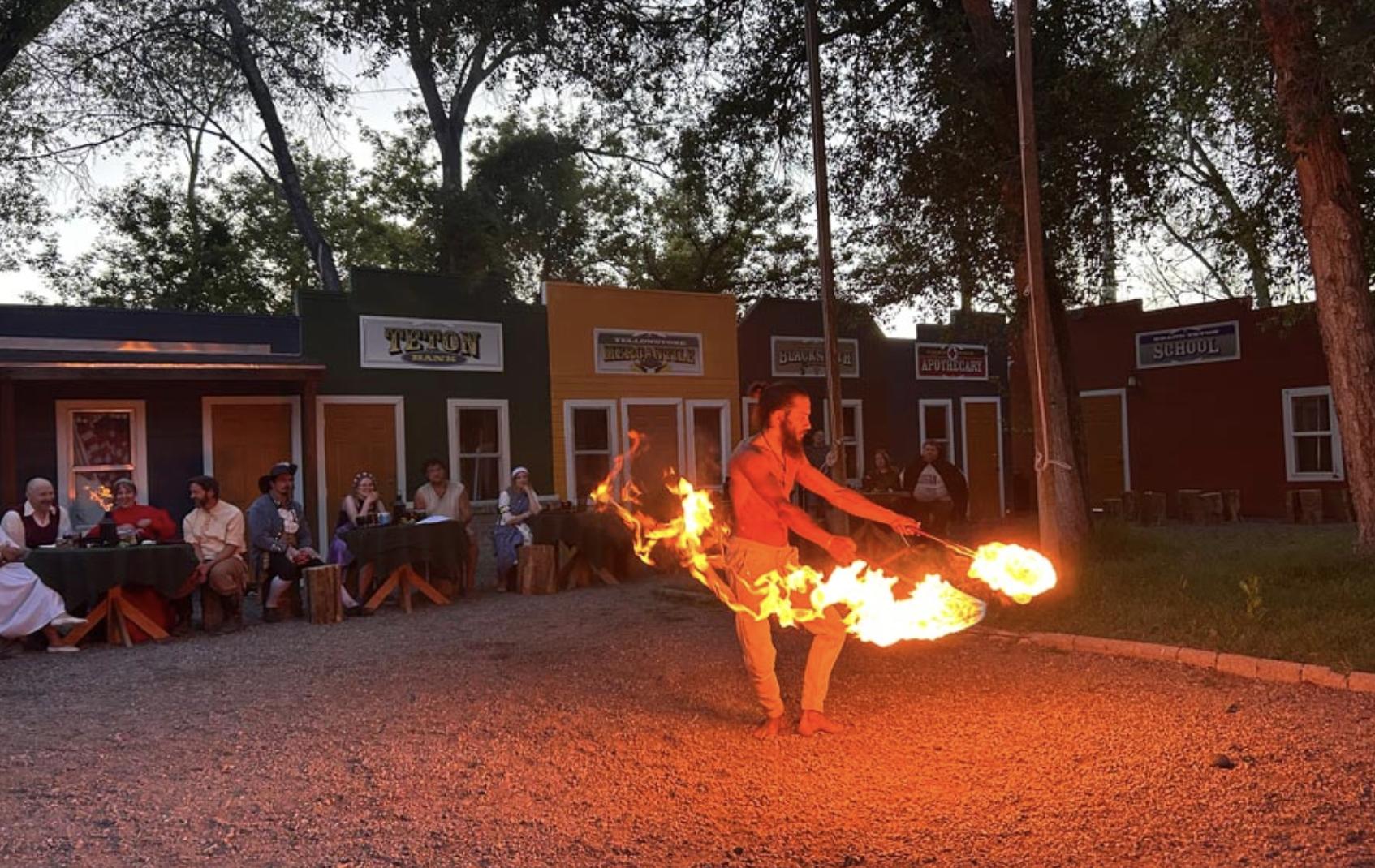 A fire dancer wows attendees of the King’s Feast at Thornshire Renaissance Faire of Idaho. The festival opens for their August season Friday, Aug. 14.