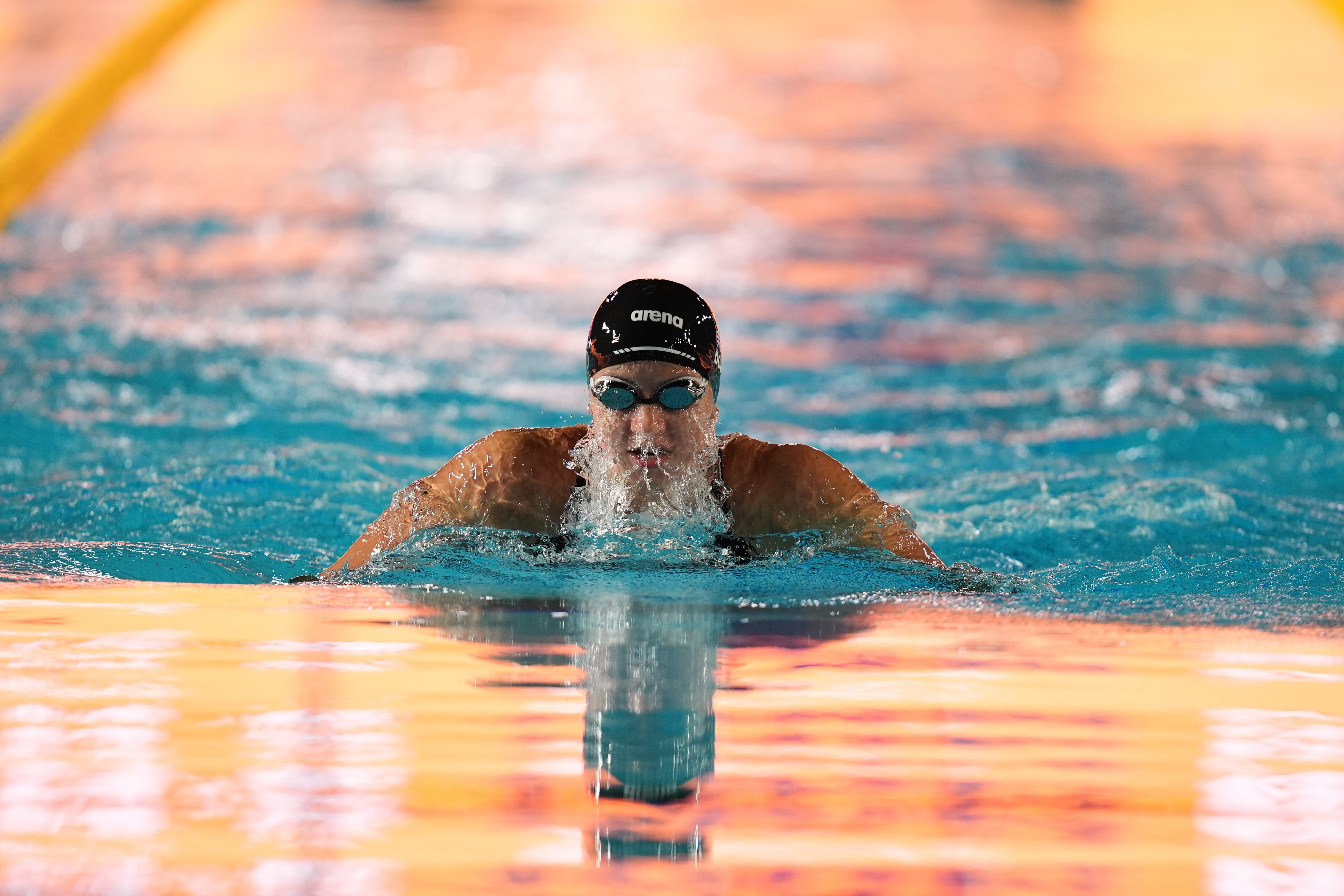 Kate Douglass, of the United States, competes in the women's 100 meters breaststroke final at the Pan Pacific Swimming Championships Thursday, Aug. 13, 2026 in Irvine, Calif. 