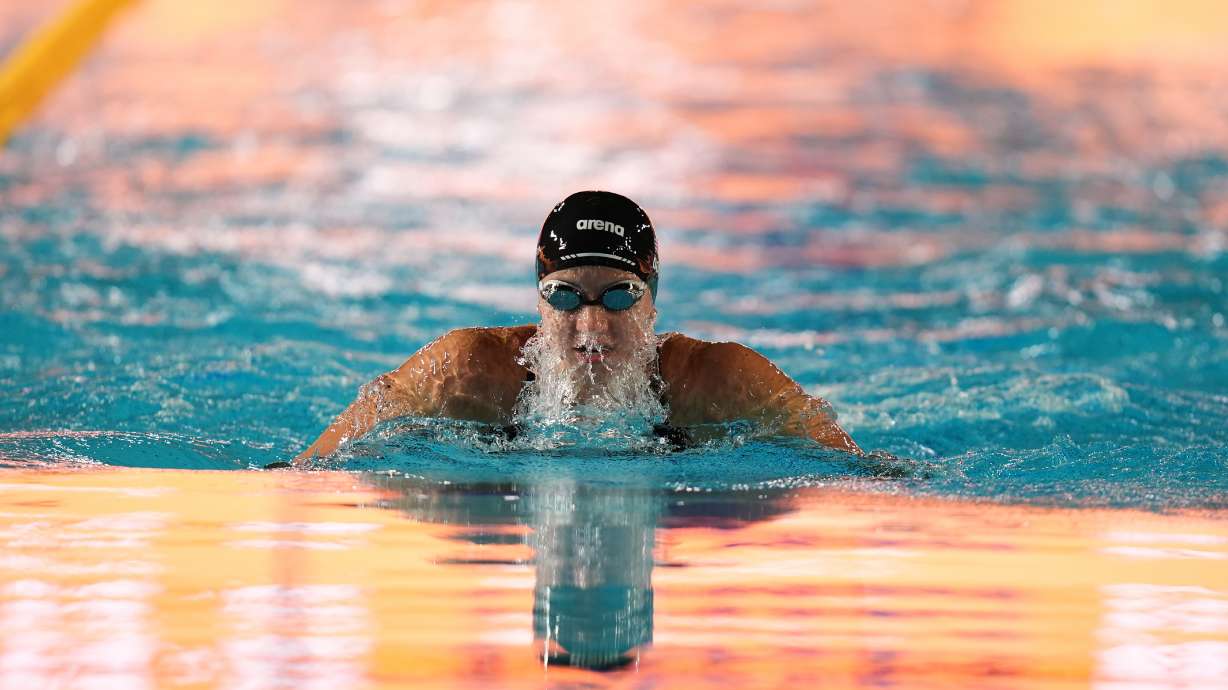 Kate Douglass, of the United States, competes in the women's 100 meters breaststroke final at the Pan Pacific Swimming Championships Thursday, Aug. 13, 2026 in Irvine, Calif.