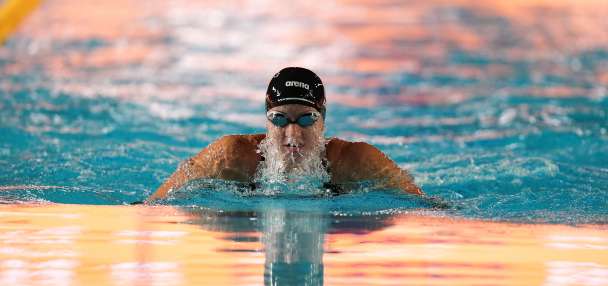 Kate Douglass blazes to 50 free world record in Pan Pacific prelims