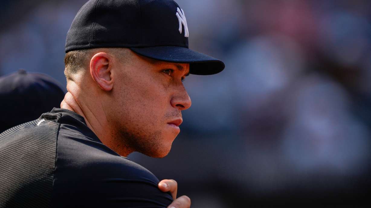 New York Yankees' Aaron Judge watches from the dugout during the ninth inning of a baseball game against the Seattle Mariners, Thursday, Aug. 13, 2026, in New York.
