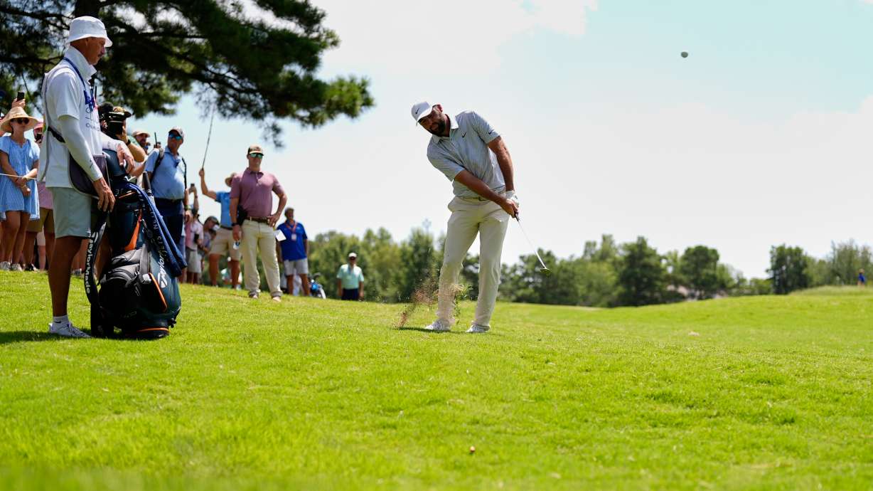 Scottie Scheffler chips onto the second green during the third round of the St. Jude Championship golf tournament Saturday, Aug. 15, 2026, in Memphis, Tenn.