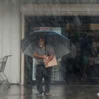 Lala is again a tropical storm, sending drenching rain and winds across the Hawaiian islands
