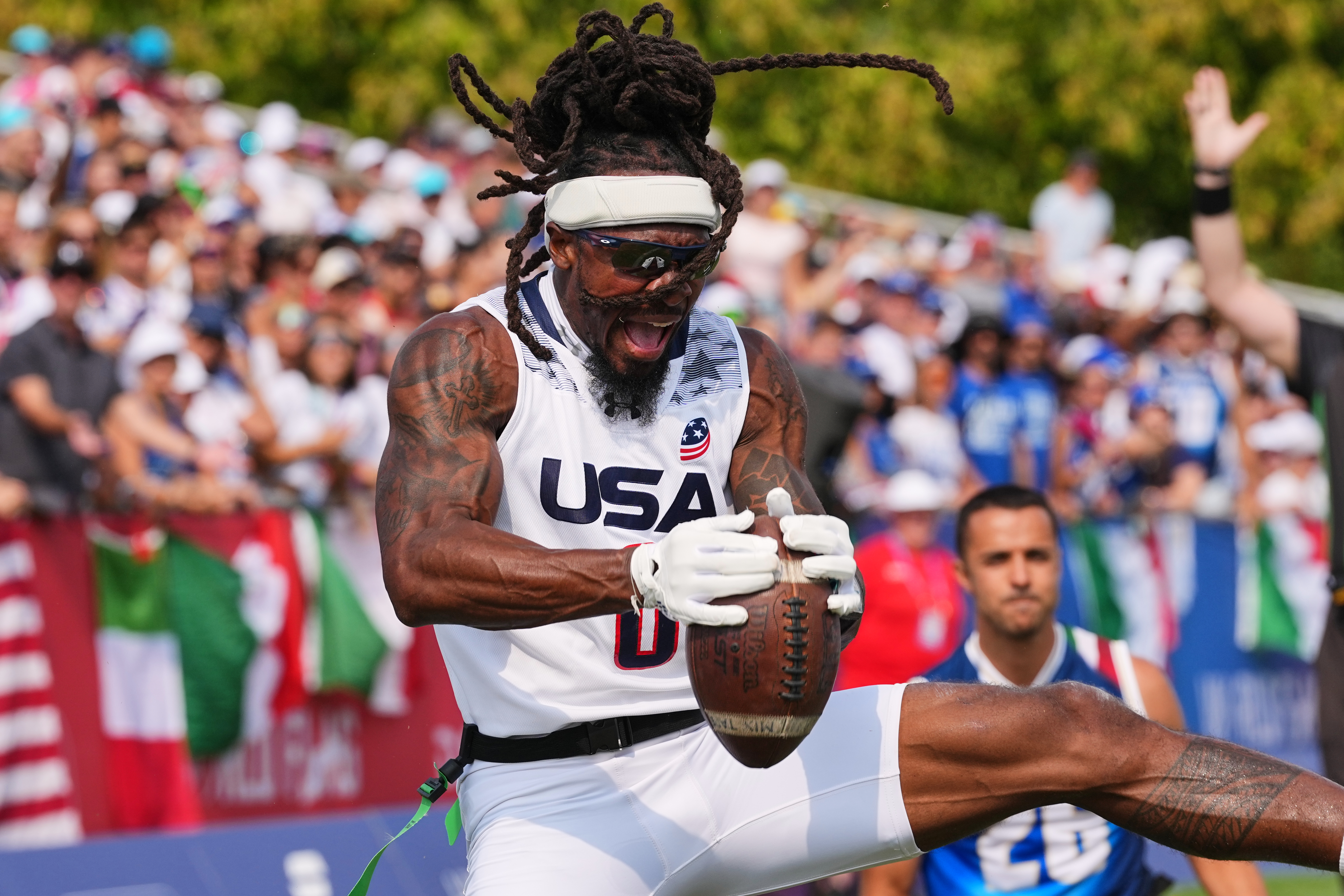 United States' Tyler "TD" Davis celebrates a touchdown during the Flag Football World Championship men's final game between Italy and USA in Duesseldorf, Germany, Sunday, Aug. 16, 2026. 