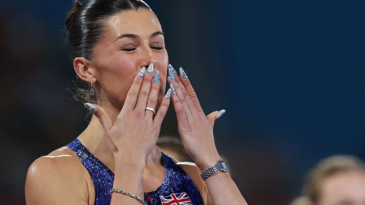 Amy Hunt of Britain prepares to compete in the mixed 4 X 100 meters relay final at the European Athletics Championships in Birmingham, England, Sunday, Aug. 16, 2026.