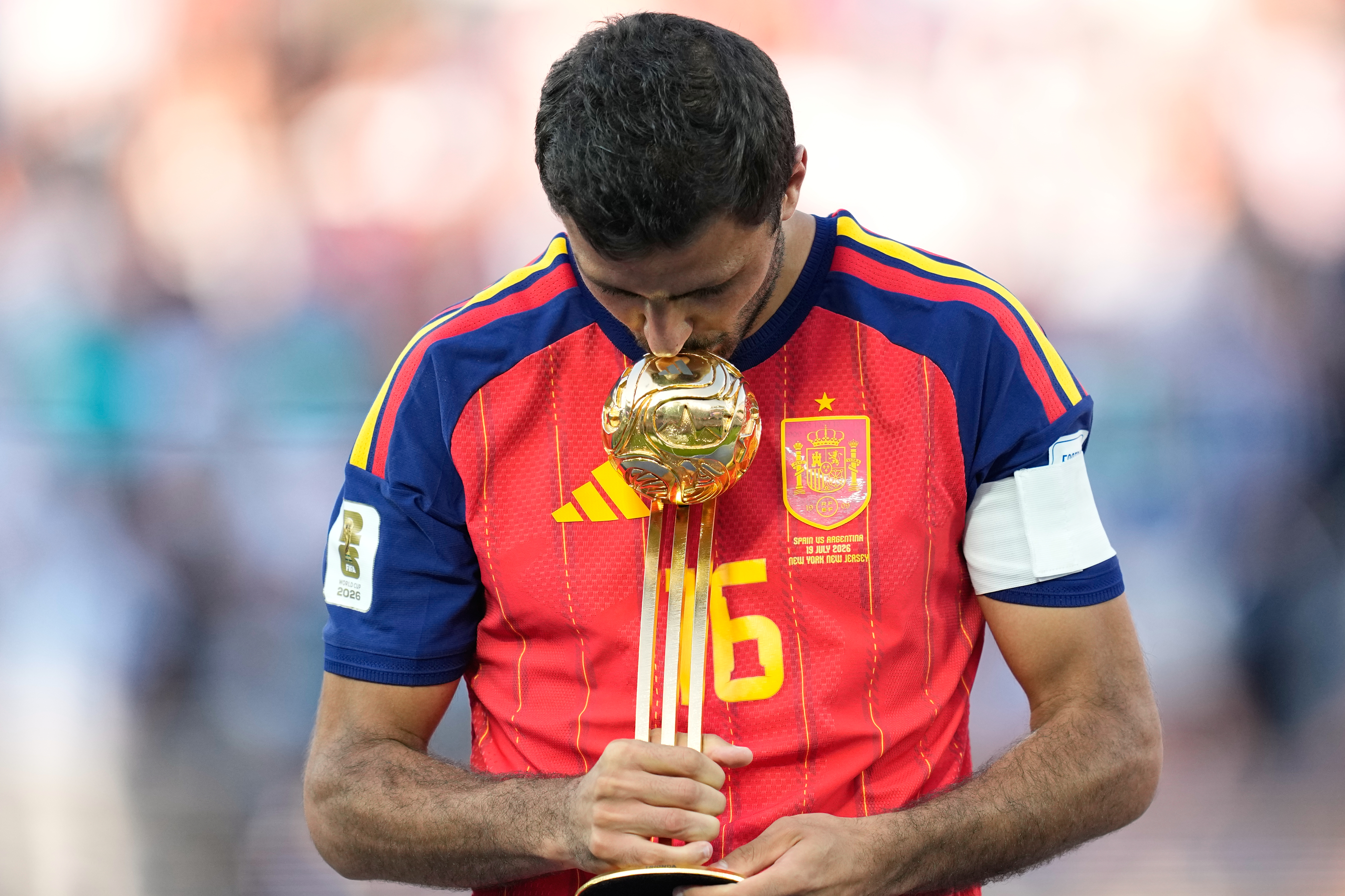 Spain's Rodri poses with the tournament's best player award at the end of the World Cup final soccer match between Spain and Argentina in East Rutherford, N.J., near New York, Sunday, July 19, 2026. 