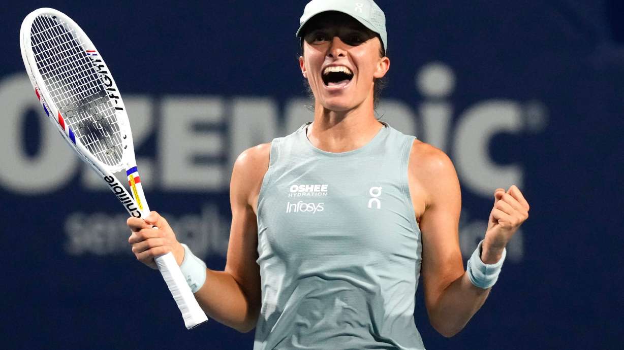 Poland's Iga Swiatek celebrates her 6-3 1-6 6-3 win over Ukraine's Elina Svitolina in a National Bank Open semifinal tennis match in Toronto on Wednesday, August 12, 2026.