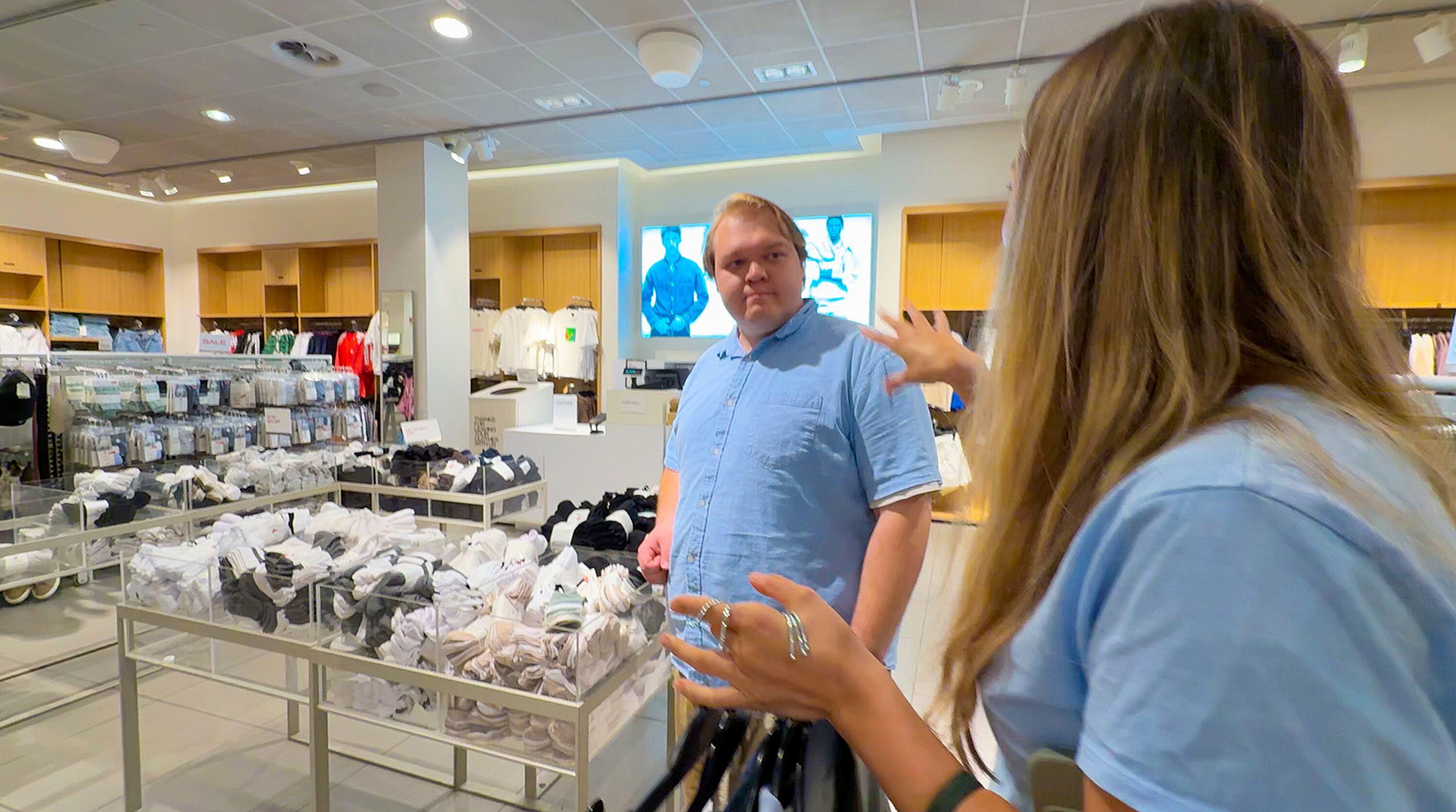 Ethan Van Valkenburg, who participated in a Utah-based dating campaign, goes shopping at a local mall.
