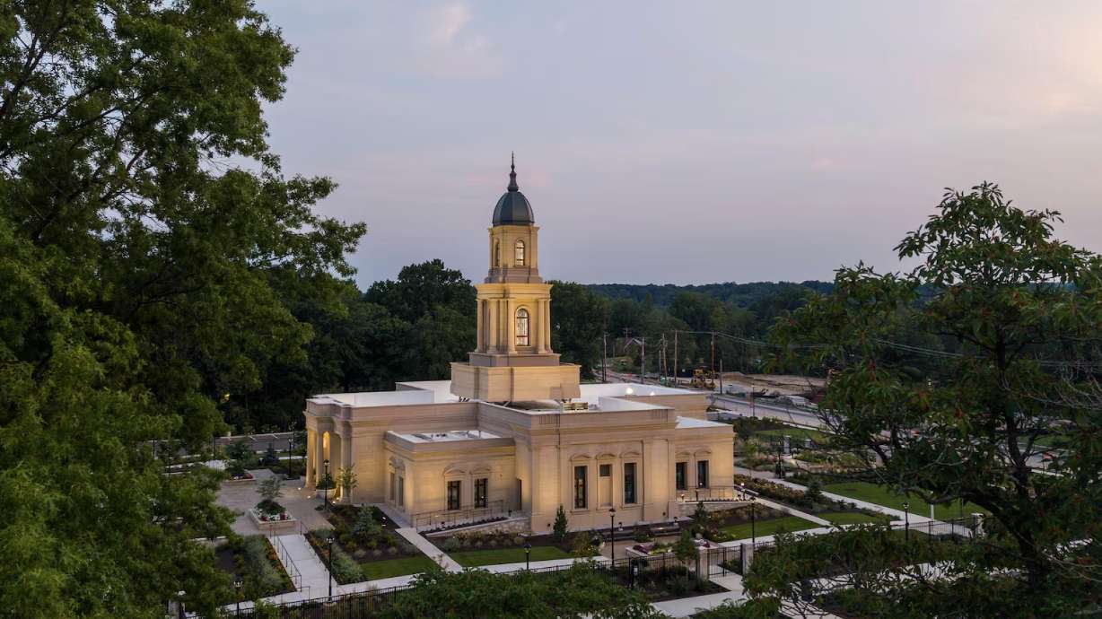 The Cleveland Ohio Temple of The Church of Jesus Christ of Latter-day Saints appears beneath a colorful sunset Friday in Independence, Ohio. The temple was dedicated Sunday by Elder David A. Bednar of the Quorum of the Twelve Apostles.