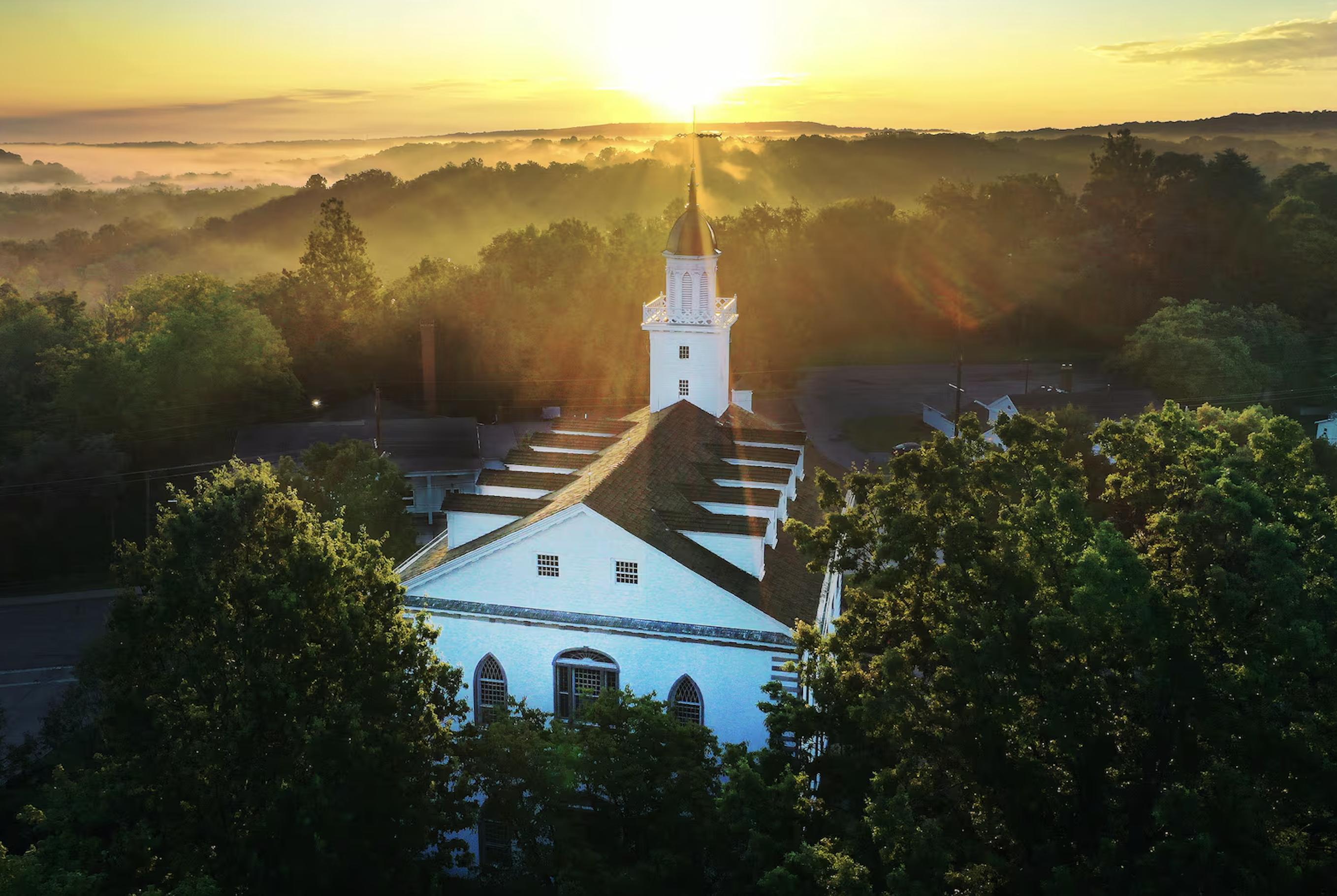 The sun rises on the Kirtland Temple of The Church of Jesus Christ of Latter-day Saints in Kirtland, Ohio, on Aug. 26, 2023.