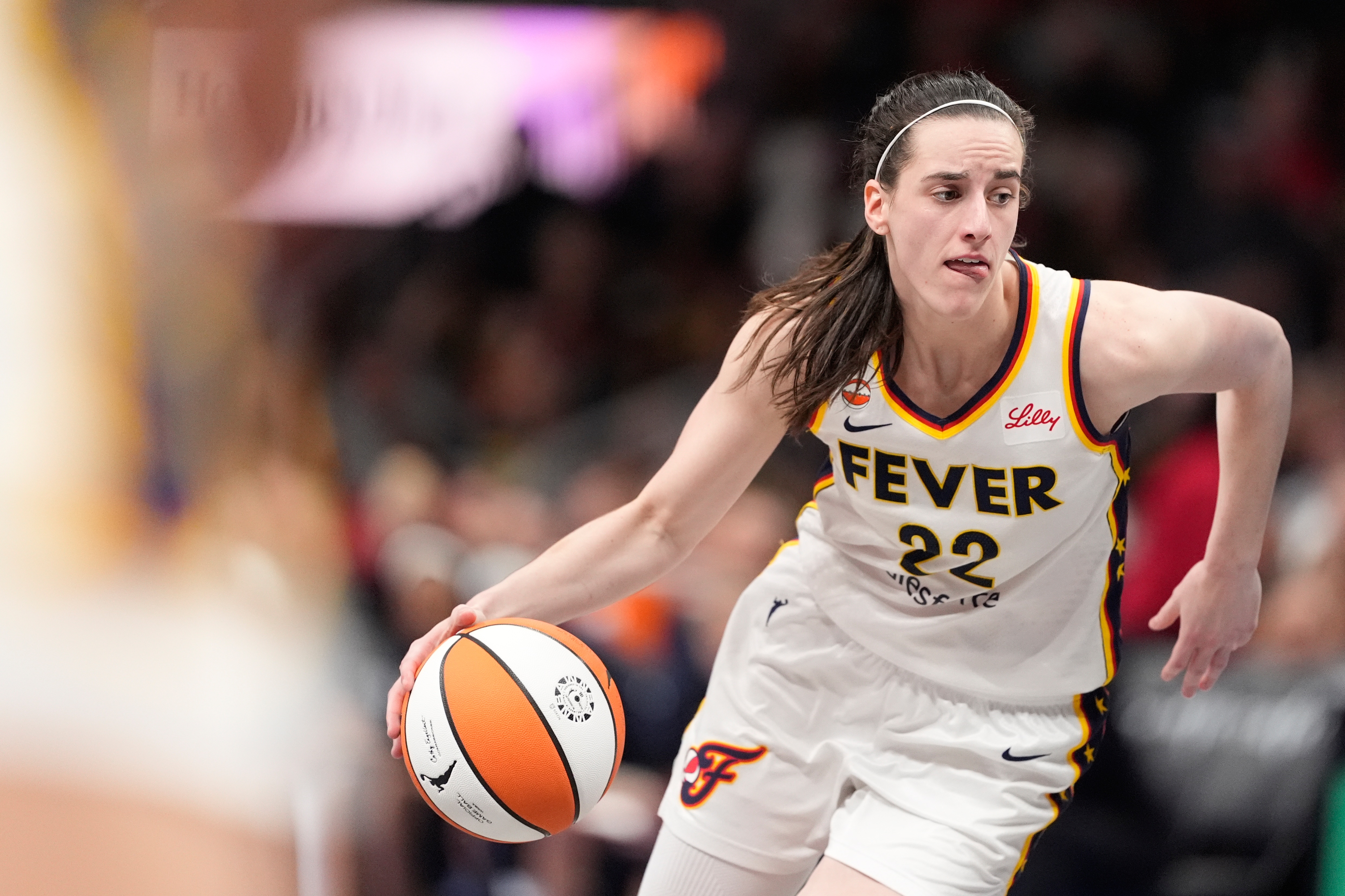 Indiana Fever guard Caitlin Clark (22) dribbles the ball in the second half of an WNBA basketball game against the Atlanta Dream Sunday, Aug. 16, 2026, in Atlanta. 