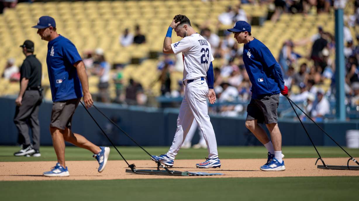 Los Angeles Dodgers' Kyle Tucker (23) walks to the outfield after grounding out during the seventh inning of a baseball game against the Milwaukee Brewers, Sunday, Aug. 16, 2026, in Los Angeles.
