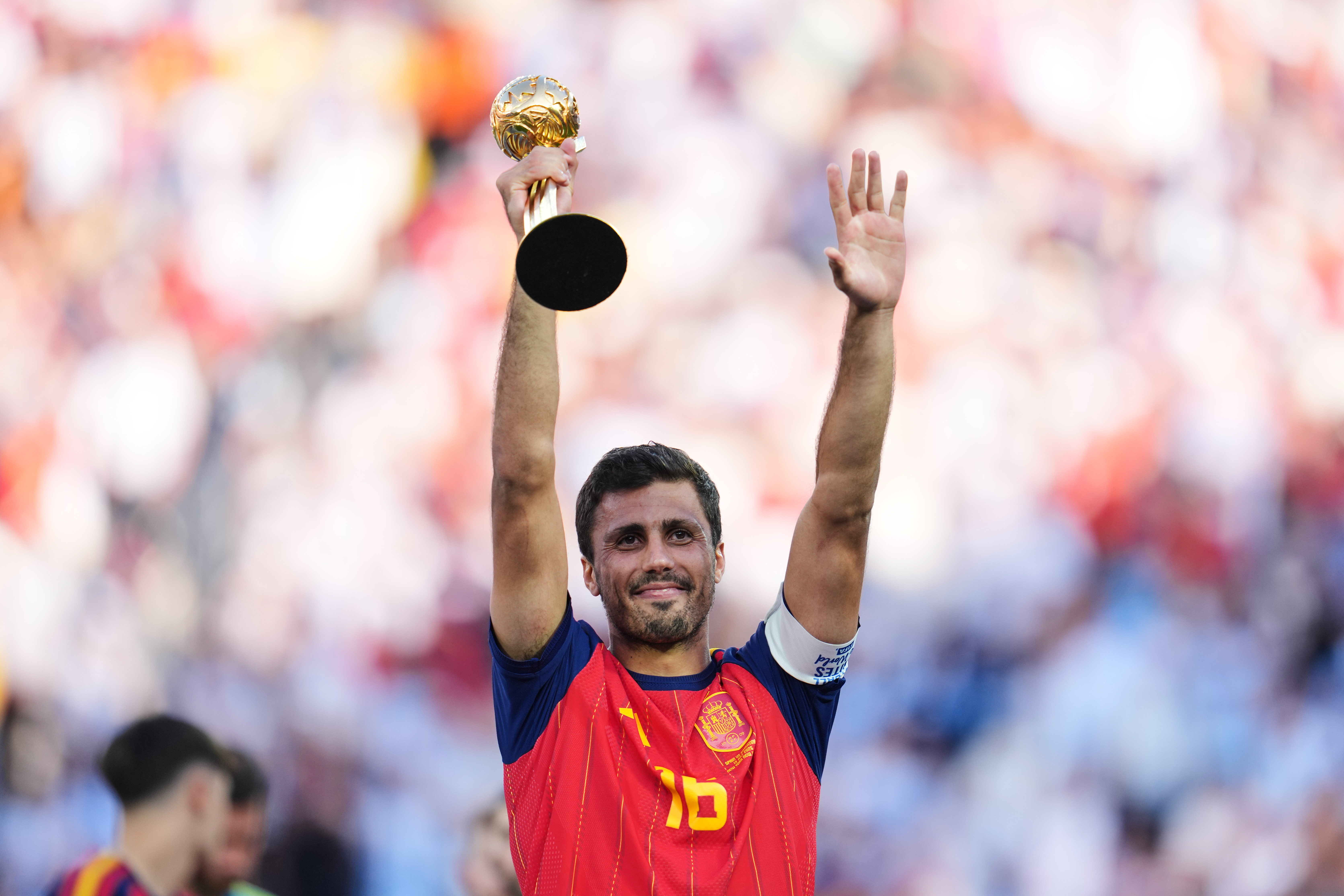 Spain's Rodri celebrates with the tournament's best player award after the World Cup final soccer match between Spain and Argentina in East Rutherford, N.J., near New York, Sunday, July 19, 2026. 