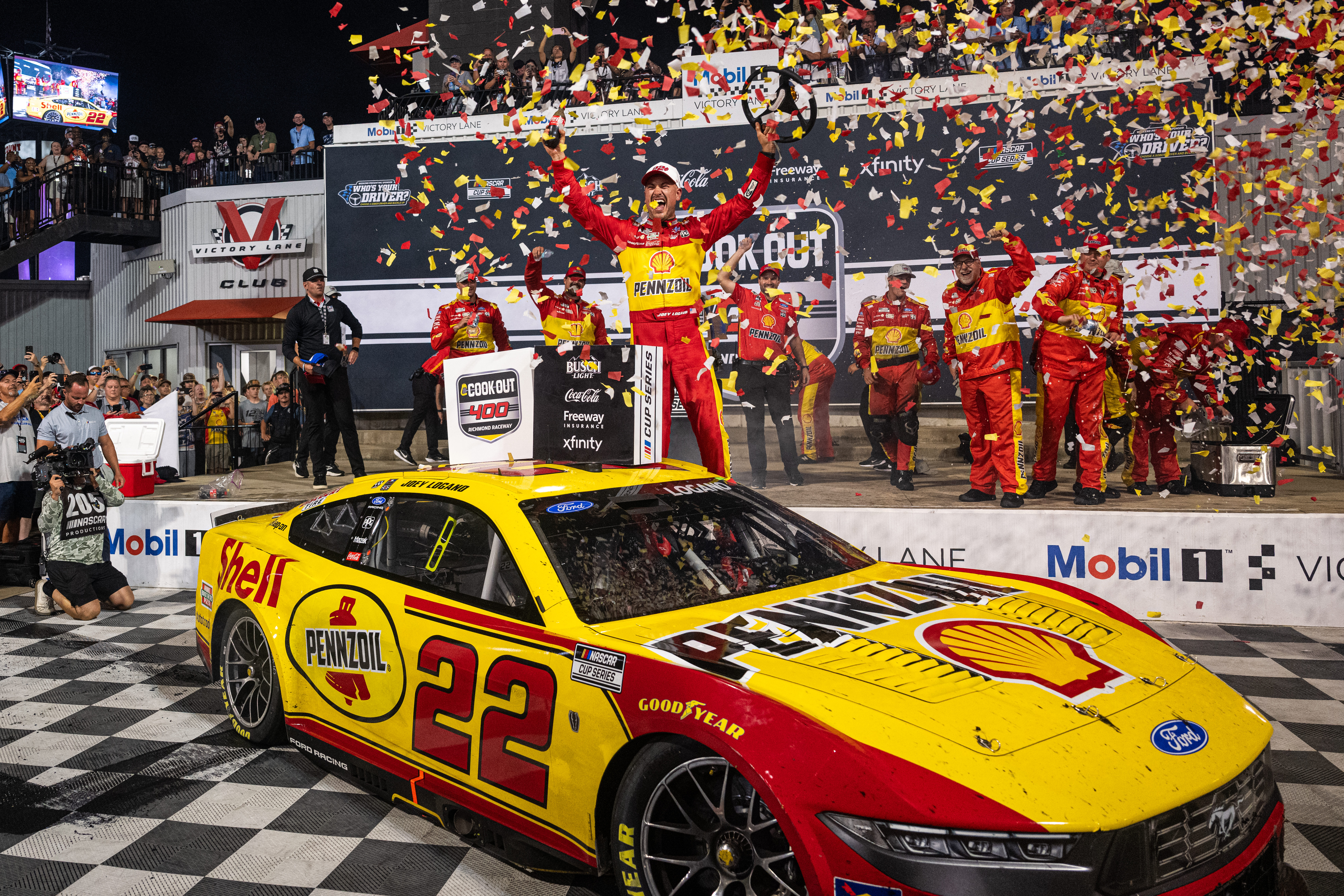 Team Penske driver Joey Logano (22) celebrates in victory lane after winning the Cook Out 400 at Richmond Raceway, Saturday, Aug. 15, 2026, in Richmond Va. 