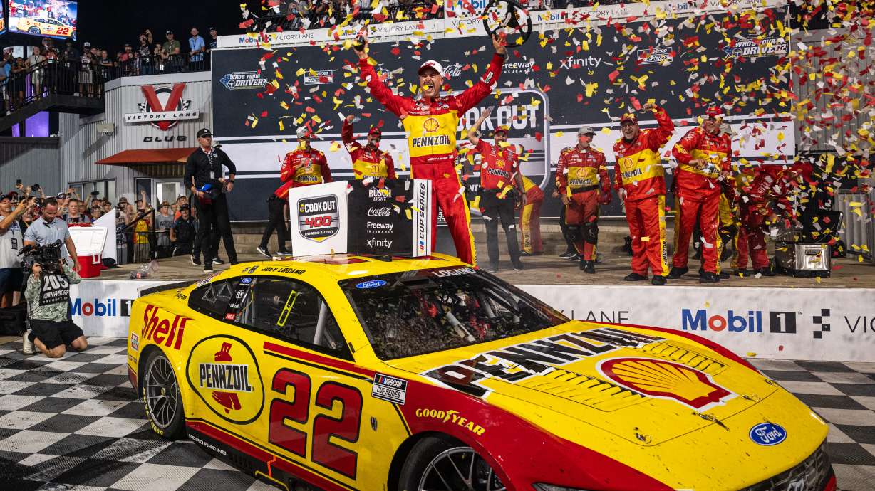 Team Penske driver Joey Logano (22) celebrates in victory lane after winning the Cook Out 400 at Richmond Raceway, Saturday, Aug. 15, 2026, in Richmond Va.