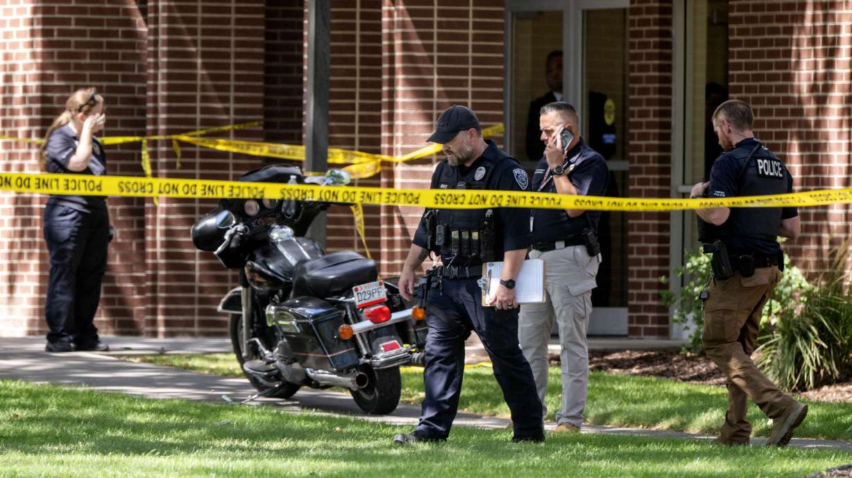 Police investigate a shooting that occurred in Kearns during a funeral on Monday. One man died and two others were critically injured.