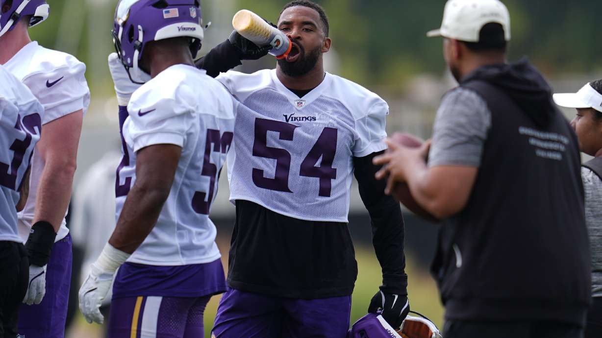 Minnesota Vikings linebacker Jamal Adams (54) hydrates during the team's NFL football training camp Wednesday, July 29, 2026, in Eagan, Minn.