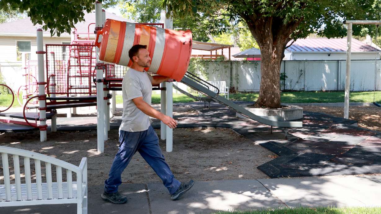 Preston Heinberger, Life is Good Investments (LIGI) foreman, prepares to close Ida M. Cotten Park for improvements in Salt Lake City on Monday. The park will get a new playground, plantings, irrigation and safety lighting.