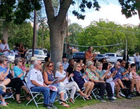 The crowd applauds Idaho Purce during her 100th birthday celebration Sunday at Purce Park in Pocatello.