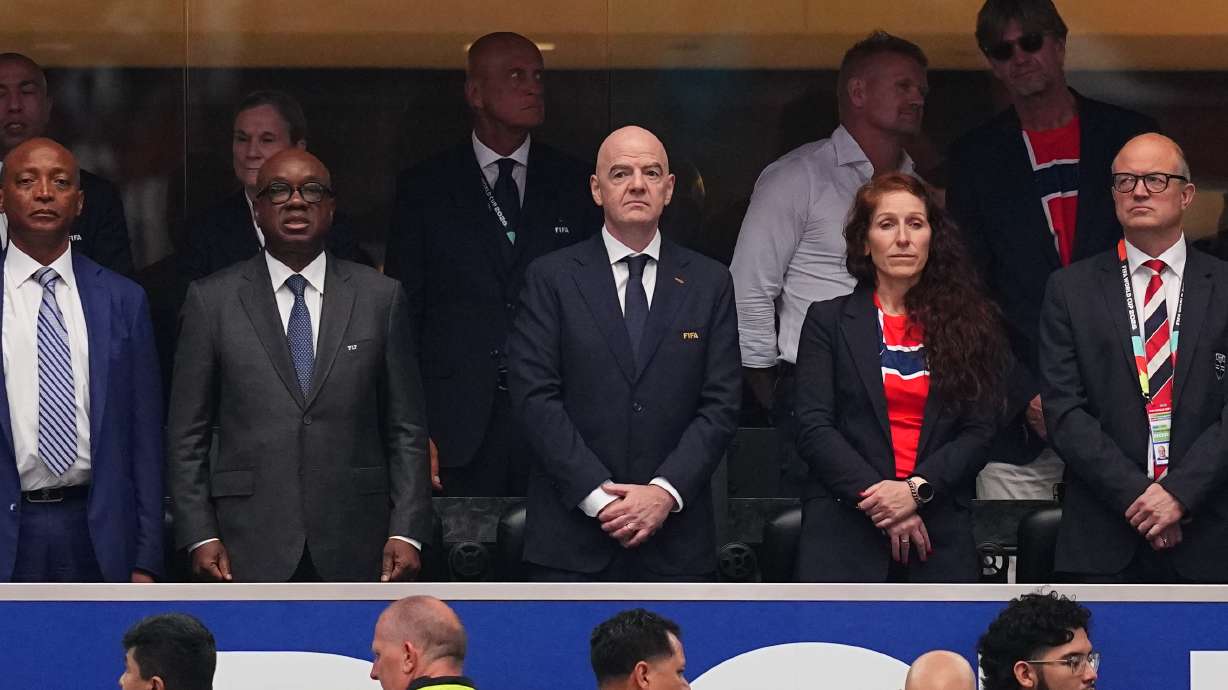 FIFA President Gianni Infantino, front center, and Norway's Football Federation president Lise Klavenessin, front second right, the stands ahead of the World Cup round of 32 soccer match between Ivory Coast and Norway in Arlington, Texas, near Dallas, Tuesday, June 30, 2026.