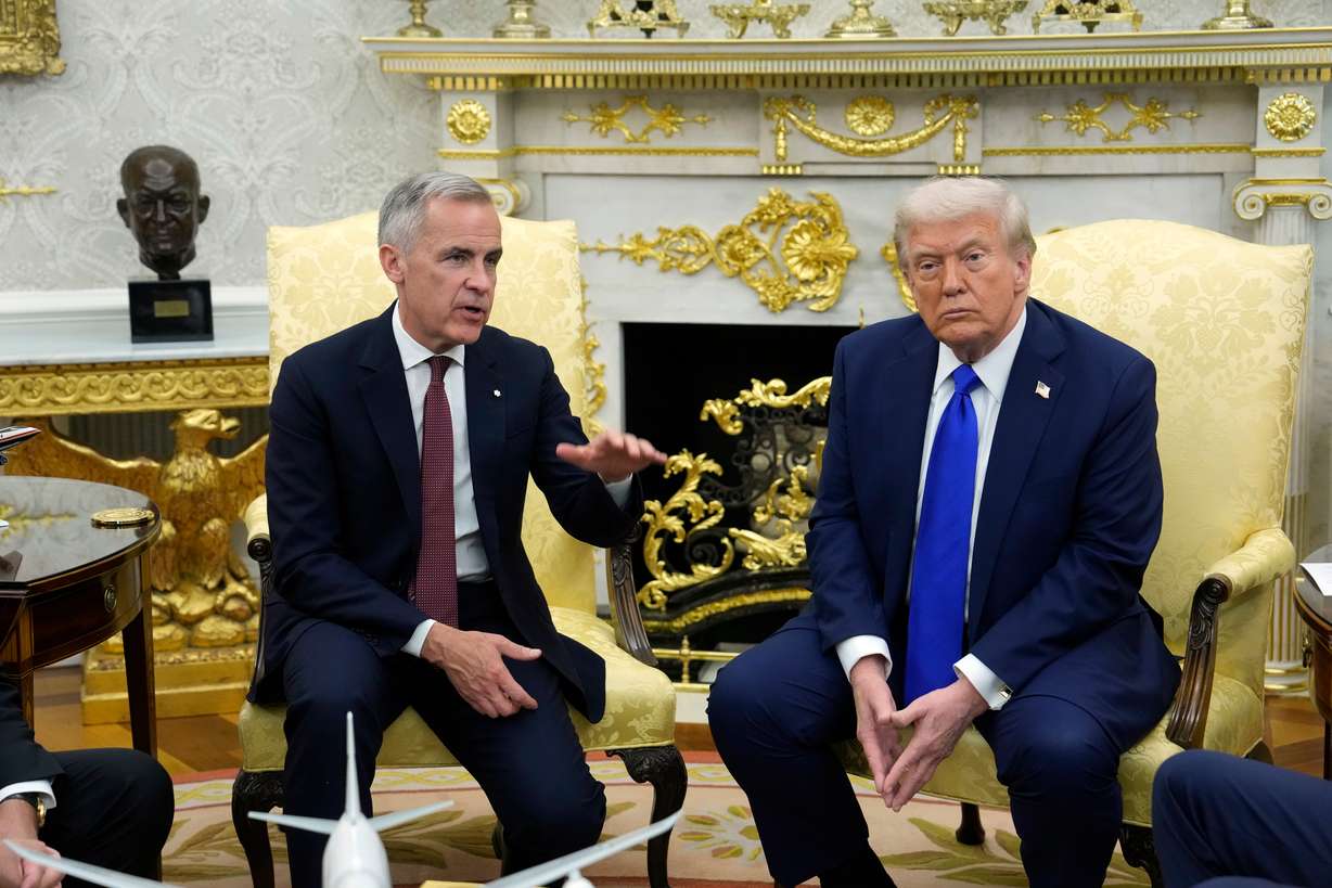 Canadian Prime Minister Mark Carney and President Donald Trump hold a press conference at the White House in Washington, Oct. 7, 2025. The U.S. and Canada are holding last-minute talks to avoid new tariffs.