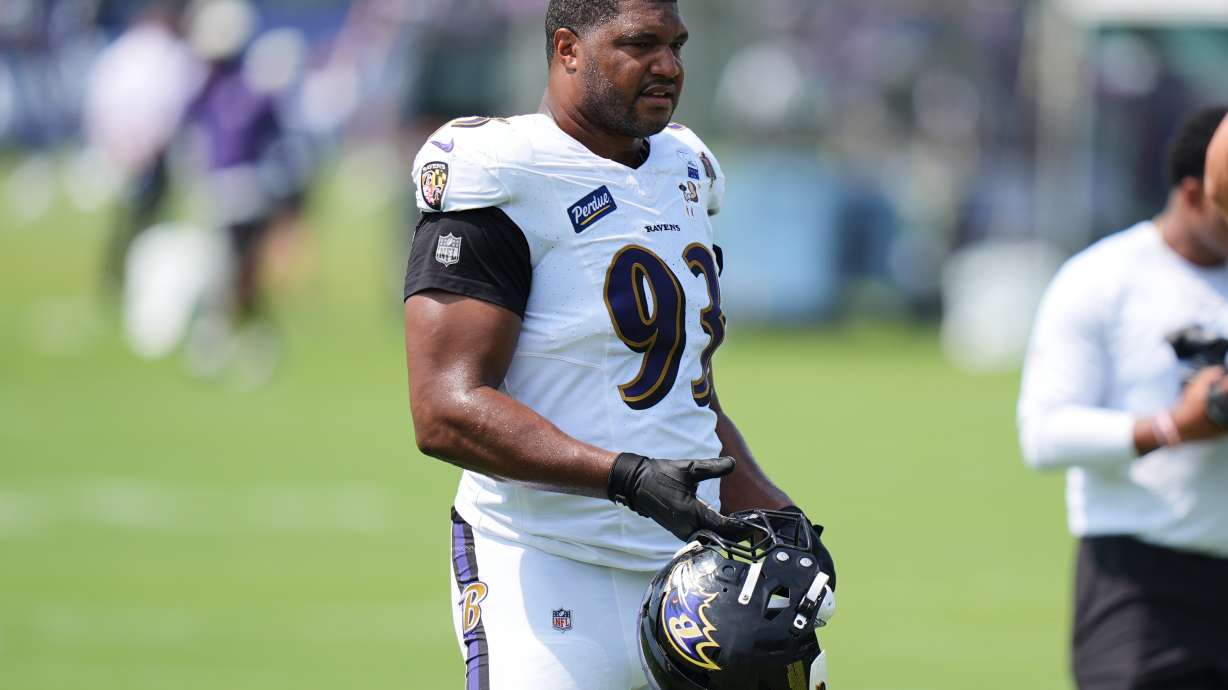 Baltimore Ravens defensive end Calais Campbell (93) watches during the team's NFL football training camp, Tuesday, Aug. 11, 2026, at the Under Armour Performance Center in Owings Mills, Md.
