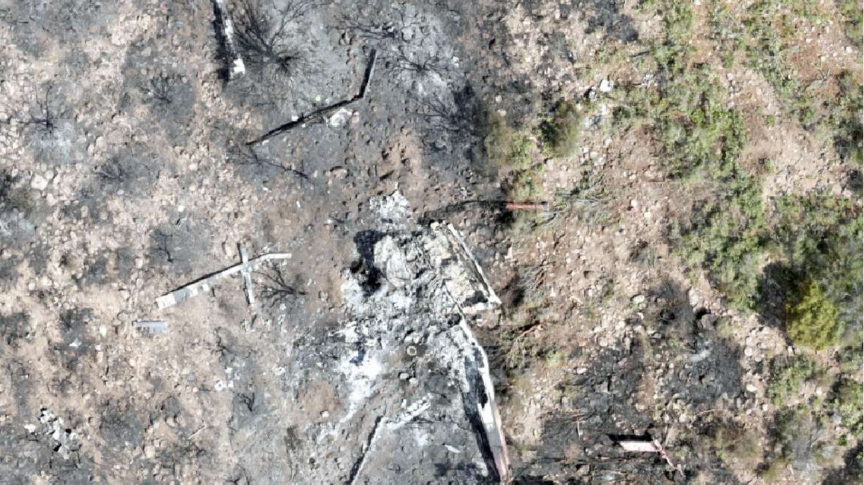 An aerial view of the crash site is pictured.