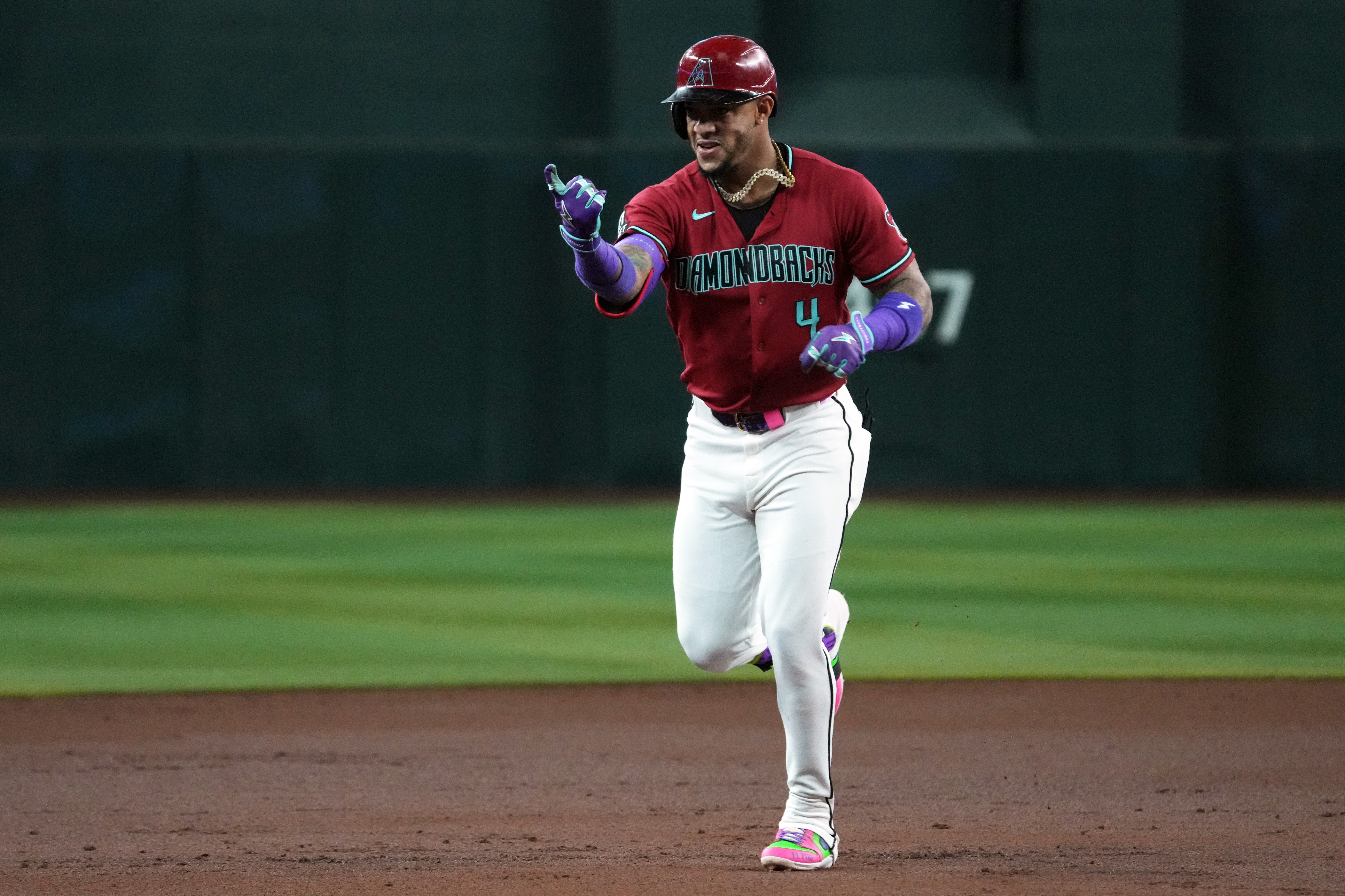 Arizona Diamondbacks' Ketel Marte reacts after hitting a solo home run against the Colorado Rockies in the first inning of a baseball game, Tuesday, Aug. 11, 2026, in Phoenix. 