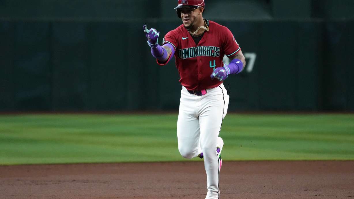 Arizona Diamondbacks' Ketel Marte reacts after hitting a solo home run against the Colorado Rockies in the first inning of a baseball game, Tuesday, Aug. 11, 2026, in Phoenix.