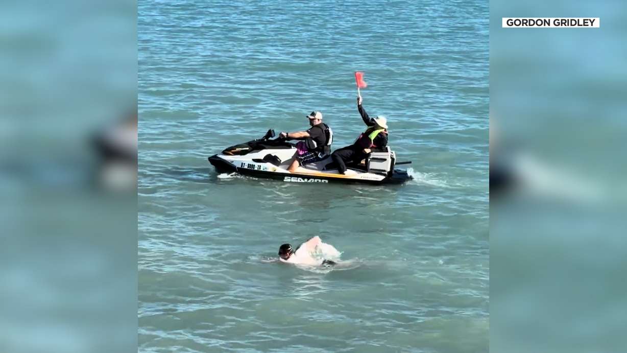 Brayden Jarrett was accompanied and guided by a jet ski at Bear Lake on Saturday.