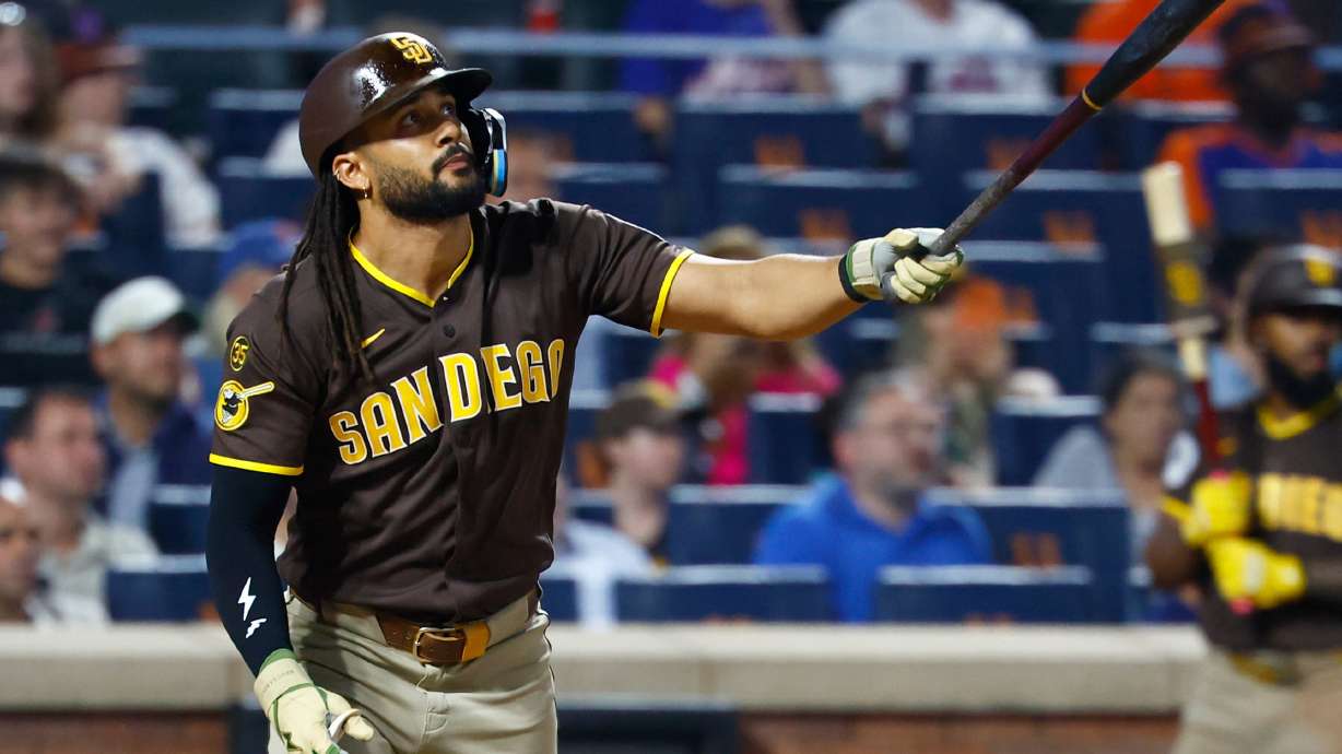 San Diego Padres' Fernando Tatis Jr. follows through on a two run home run against the New York Mets during the fifth inning of a baseball game, Tuesday, Aug. 18, 2026, in New York.