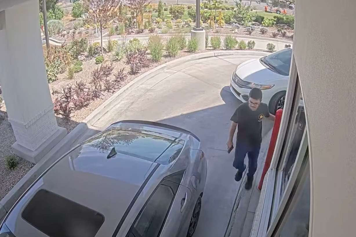 Chad Williams holding a gun and approaching a car in an In-N-Out drive-thru, Aug. 1, in Twin Falls, Idaho. James Keith of ALERRT emphasized law enforcement has priority to end an active shooter threat.