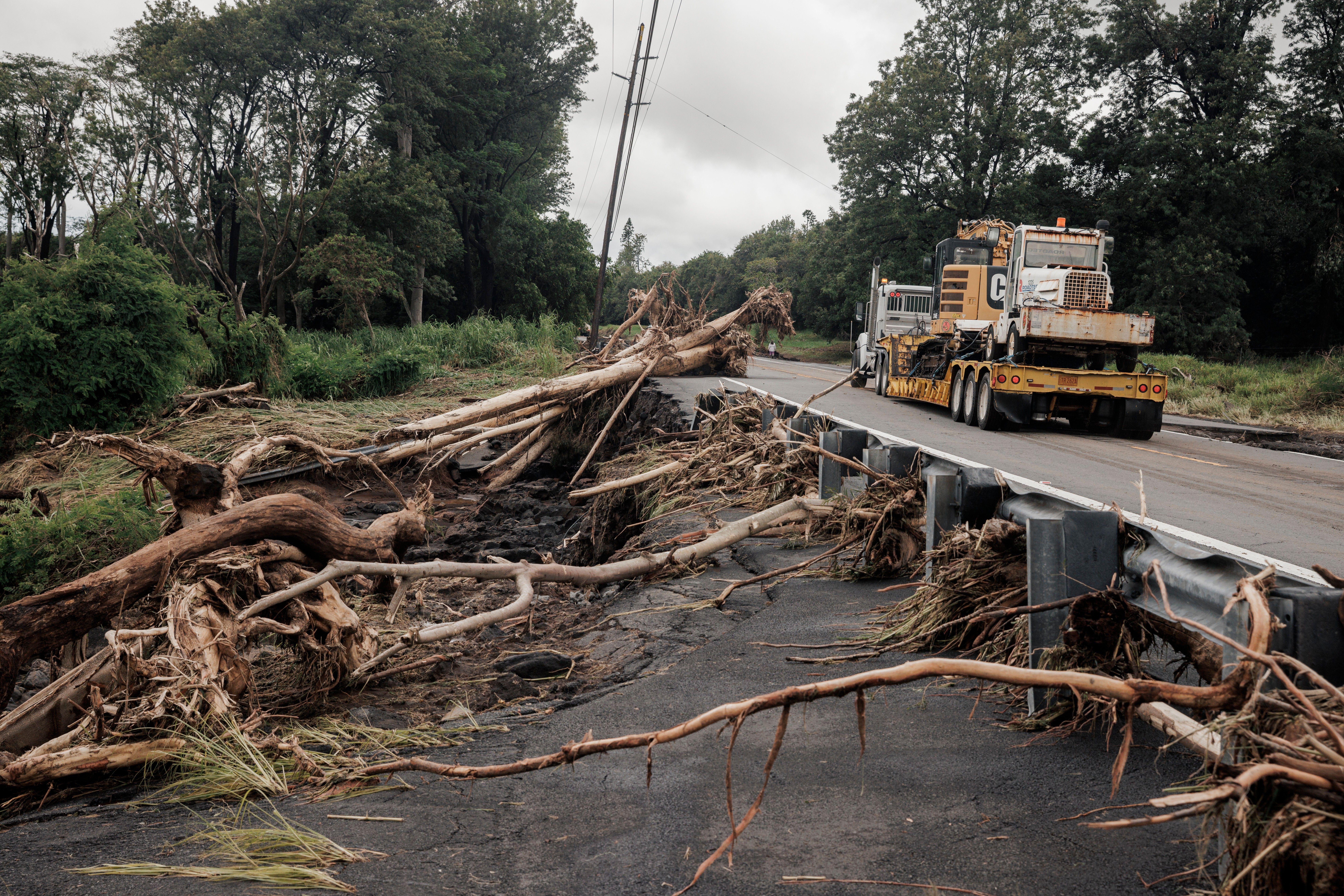 Former teacher, 93, among the deaths blamed on storm as Hawaii residents struggle to clean up