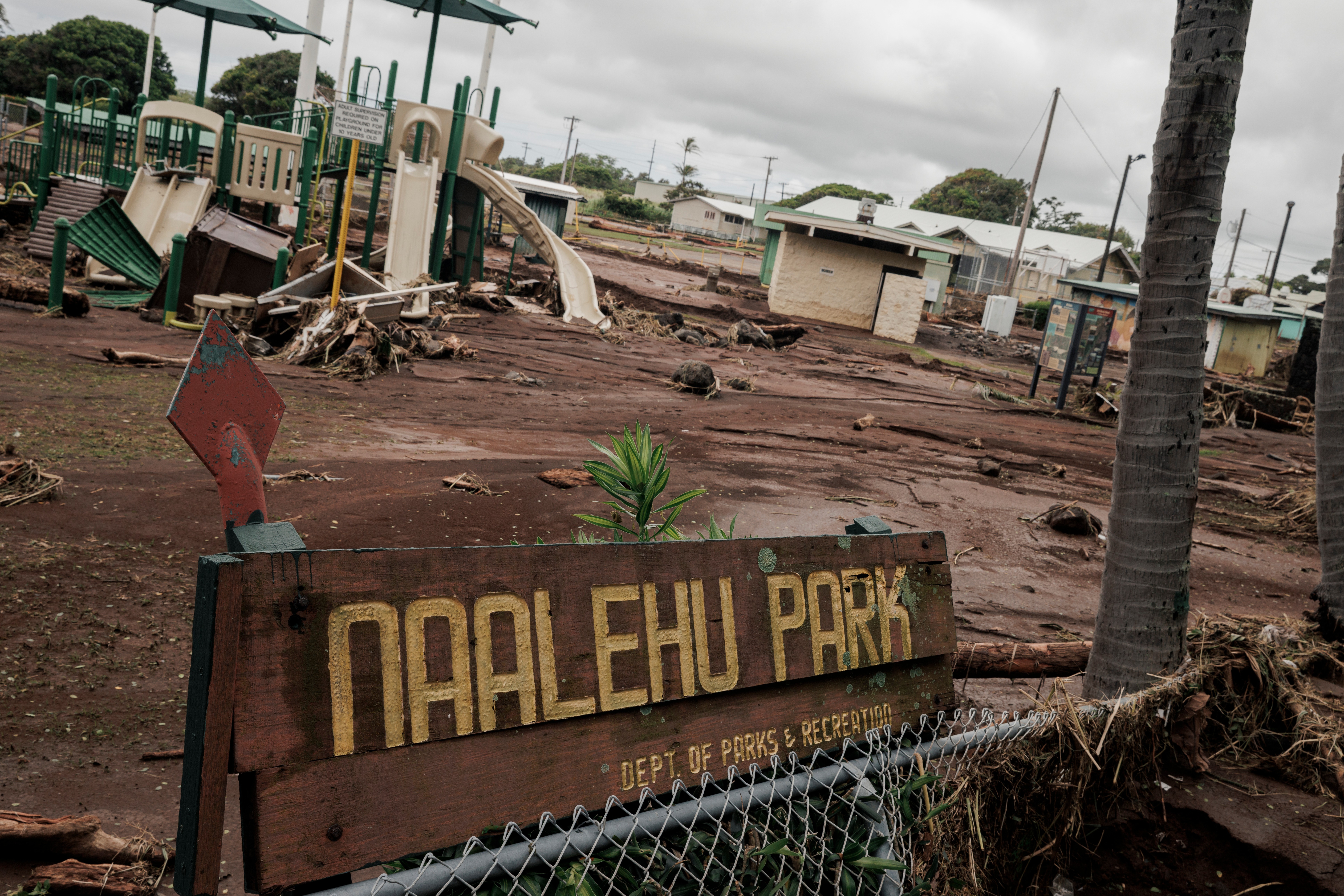 Debris is strewn across Naalehu Park after Hurricane Lala in Naalehu, Hawaii, on Monday.