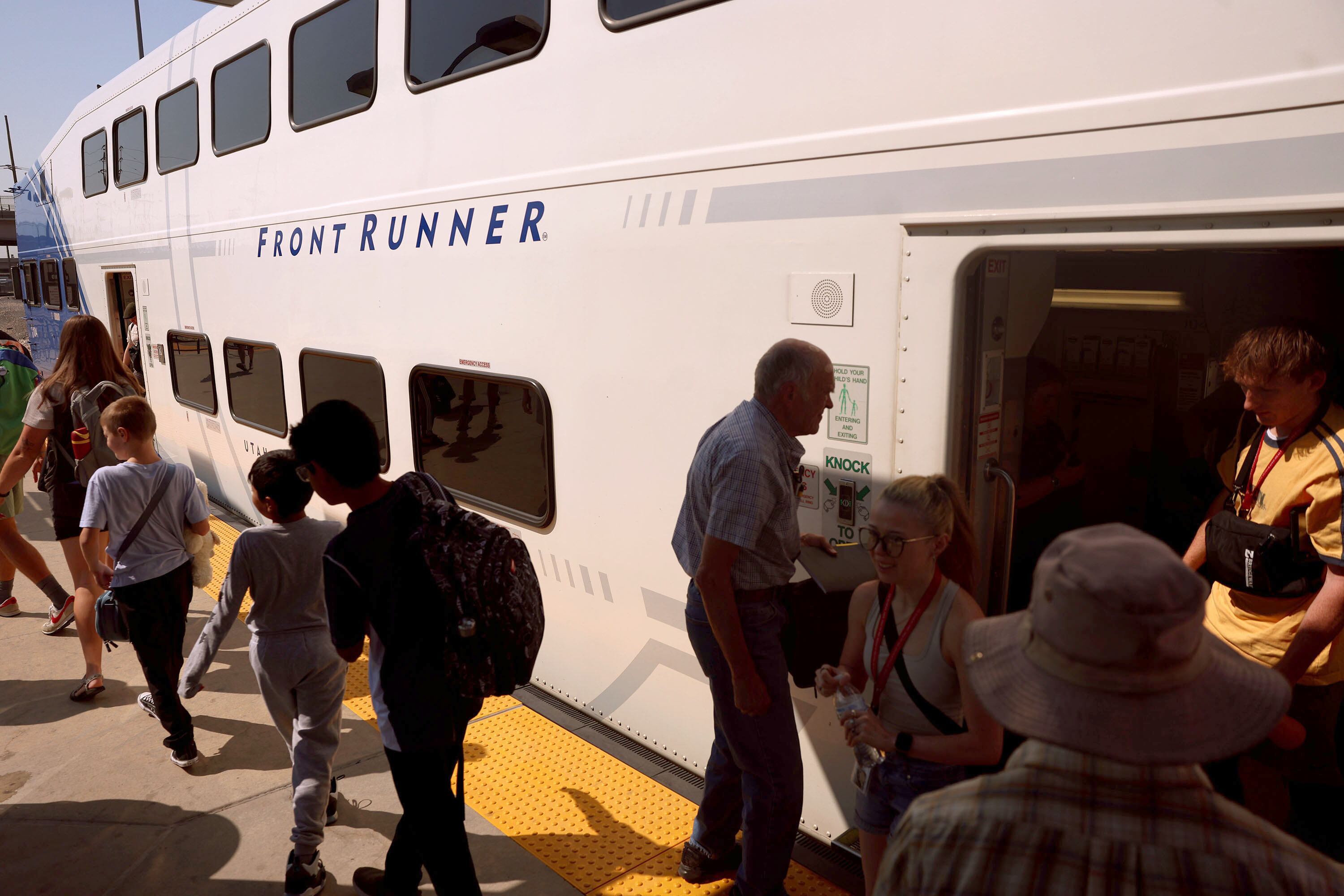 Passengers disembark a FrontRunner at the Intermodal Hub in Salt Lake City on Aug. 7. The Federal Transit Administration approved FrontRunner 2X to enter the Engineering phase of its Capital Investment Grants program, moving the project closer to securing nearly $1.3 billion in federal funding. The project will add 26.1 miles of double track in 11 locations, a new station, 10 trainsets and a new maintenance facility. Once complete, these improvements will support 15-minute service during peak periods and 30-minute service throughout the day.