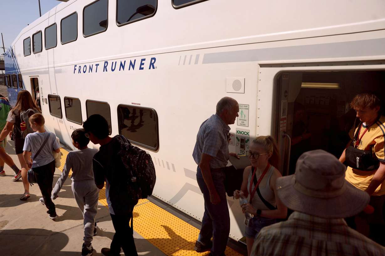 Passengers disembark a FrontRunner at the Intermodal Hub in Salt Lake City on Aug. 7. The Federal Transit Administration approved FrontRunner 2X to enter the Engineering phase of its Capital Investment Grants program, moving the project closer to securing nearly $1.3 billion in federal funding. The project will add 26.1 miles of double track in 11 locations, a new station, 10 trainsets and a new maintenance facility. Once complete, these improvements will support 15-minute service during peak periods and 30-minute service throughout the day.